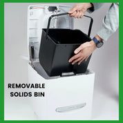 Inside the Cuddy composting toilet showing how to remove the patented solids bin to empty the toilet.