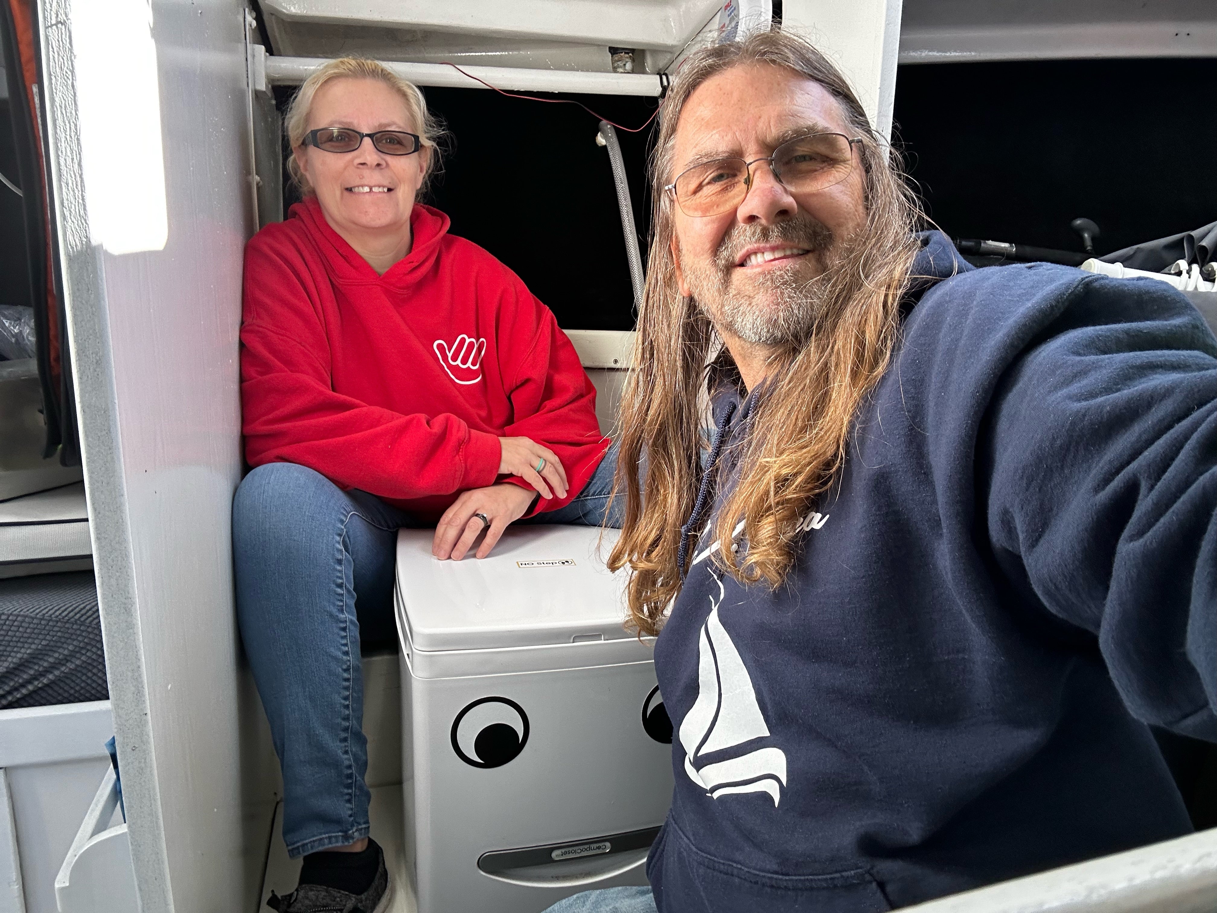 jeff-and-jules-on-sailboat-with-their-compost-toilet.jpg